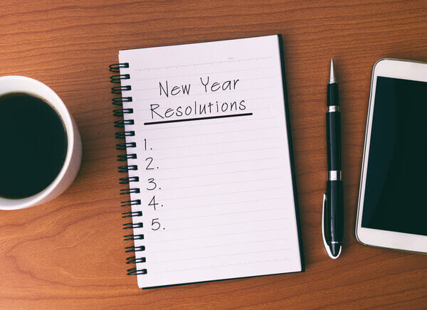 Writing page with New Year's resolution lists